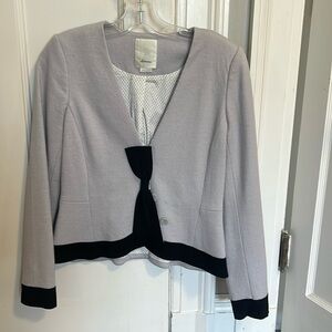 Anthropologie Size 8 gray blazer with black trim and bow. Great condition!
